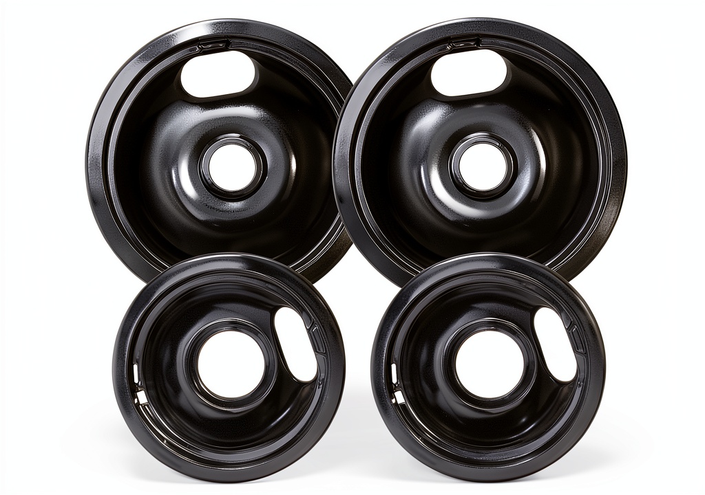 'Blutoget electric stove drip pans in black porcelain on a stove'
